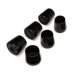 three sets of black high heel protective caps