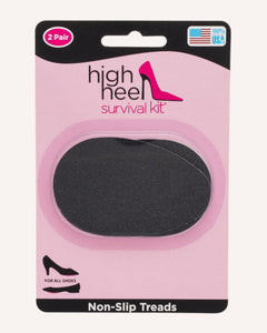 2 pairs of black high heel stick-on treads in retail packaging. text reads 